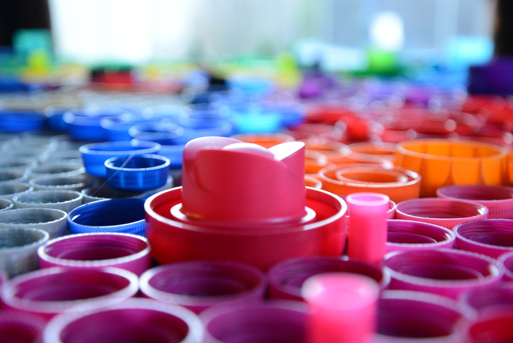 Why are water bottle cap colors different?, by Dicle Belul